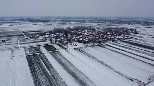 航拍冬天村庄雪景视频素材模板下载