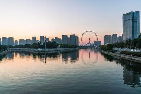 河畔摩天轮与城市建筑景观