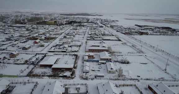 呼伦贝尔冬天雪景农垦农场民居村落景观