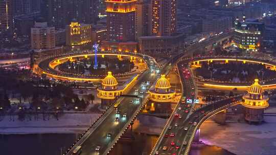 中国黑龙江哈尔滨公路大桥夜晚雪景航拍