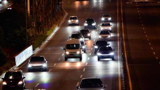 夜晚快速路隧道口车流马路行车亮化