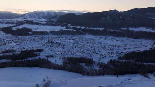 新疆阿勒泰地区禾木村雪景航拍