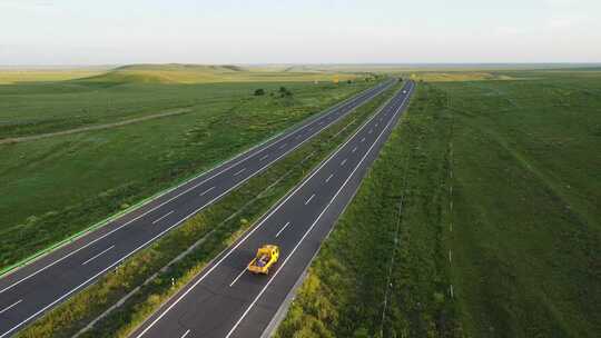 航拍内蒙草原公路风车