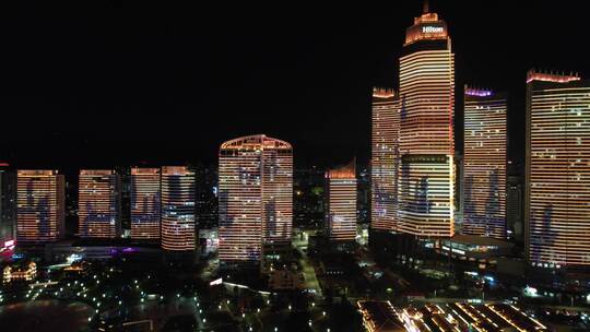 山东烟台滨海广场世贸大厦夜景灯光秀航拍