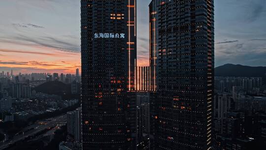 航拍深圳东海国际公寓傍晚夕阳镜头视频素材模板下载
