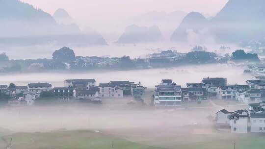 4k航拍万峰林平流雾 水墨画般的乡村晨景
