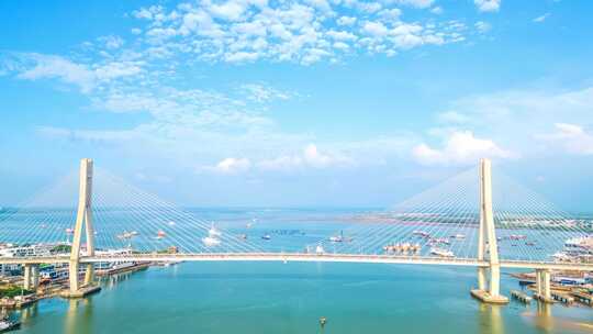 海南儋州市洋浦大桥航拍蓝天白云与海洋延时