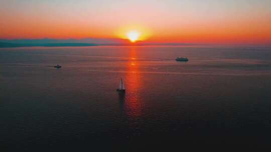 大海日出帆船航行渔船出海海上夕阳落日