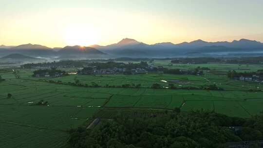 中国侨乡广东台山乡村稻田山脉山峰日出航拍