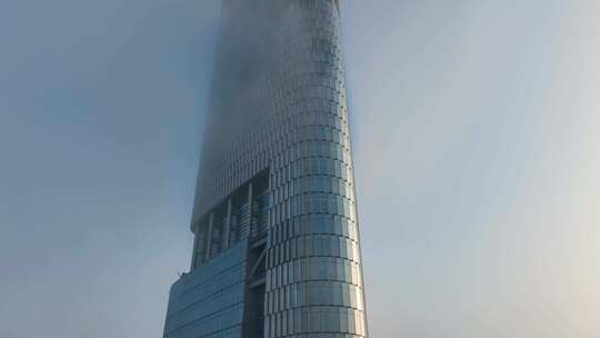 航拍云海中的南京紫峰大厦