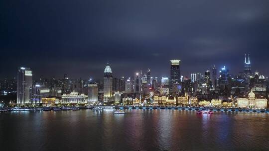 航拍外滩著名建筑上海海关大楼与黄浦江夜景