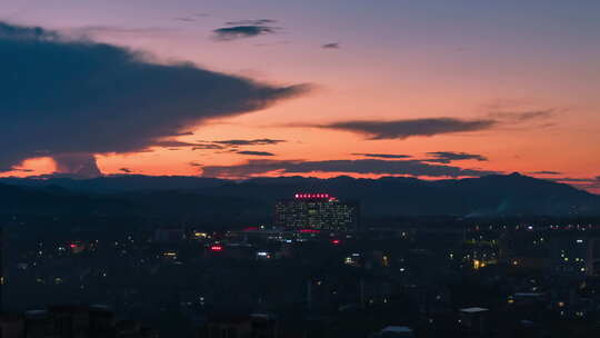 城市日落夕阳火烧云延时县城城区航拍延时