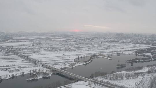 冬天大雪的东北日落东北大地