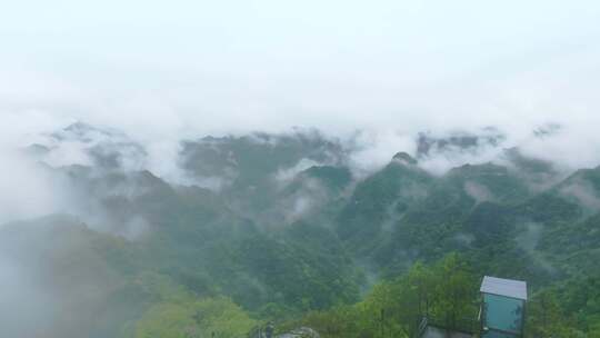 航拍大自然山林间的巍峨山峰俯瞰4k素材