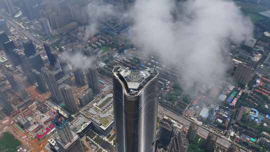 航拍雨后平流雾武汉绿地中心建筑风光