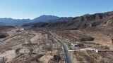 航拍山间蜿蜒公路高清在线视频素材下载