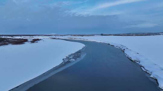 航拍海拉尔河不冻河初春雪景