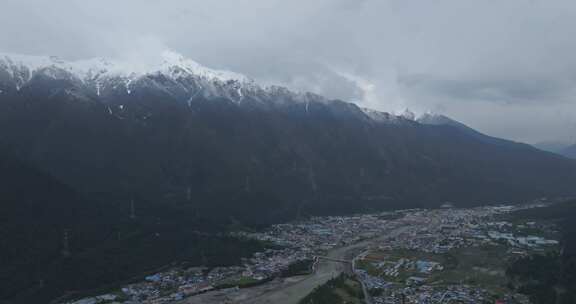 西藏林芝地区波密县城寺庙雪山高空航拍