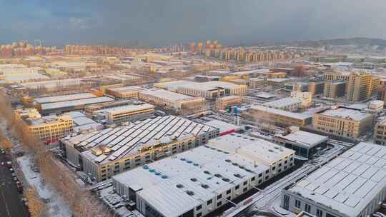 冬季航拍烟台大雪后的城市建筑和晚霞风景