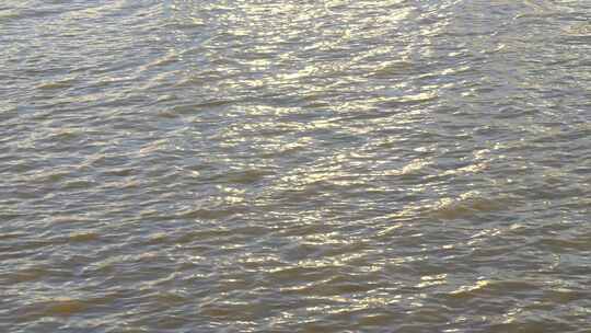 阳光水面海面阳光波光粼粼湖面俯拍特写波纹视频素材模板下载