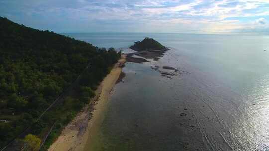 航拍海南三亚西岛海洋文化旅游区海浪礁石