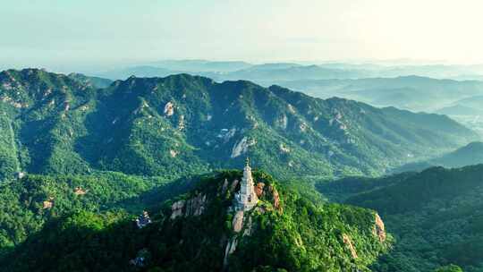 航拍千山绿色山林和大佛寺塔