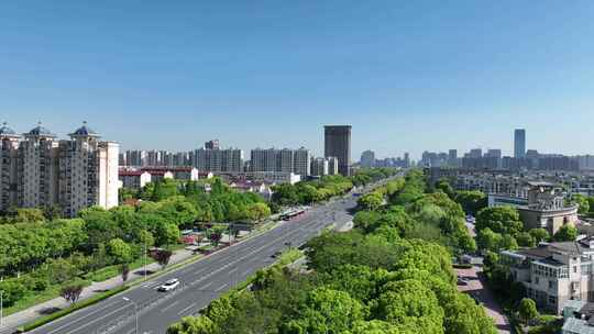 4K航拍昆山城市主干道街景风光