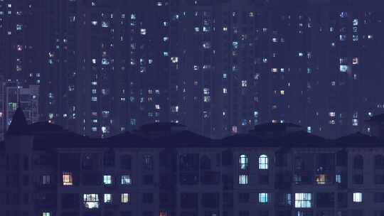寒冷夜晚城市居民区万家灯火延时摄影视频素材模板下载