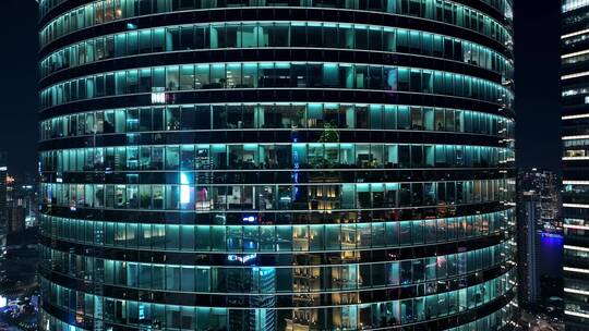 现代建筑夜晚灯光通明白领加班-上海陆家嘴视频素材模板下载