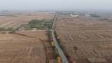 航拍田野间公路乡村风光高清在线视频素材下载