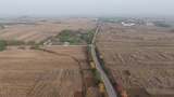 航拍田野间公路乡村风光高清在线视频素材下载