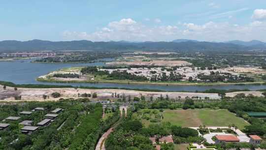 航拍三亚海棠湾沙滩海浪海岸线海景酒店蓝天