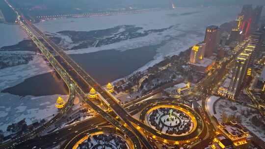 中国黑龙江哈尔滨公路大桥夜晚雪景航拍