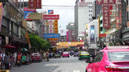泰国曼谷唐人街街道道路商铺商店汽车车辆视频素材模板下载