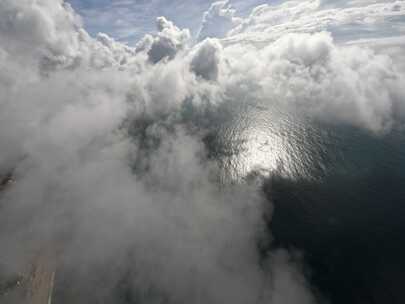 檀悦都喜天丽酒店fpv穿越机航拍海边穿云层