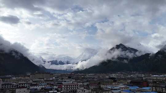 西藏旅行波密冰川之乡城市雪山自然风光航拍