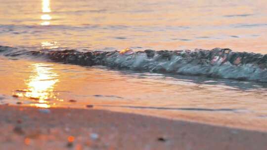 海边沙滩夕阳浪花