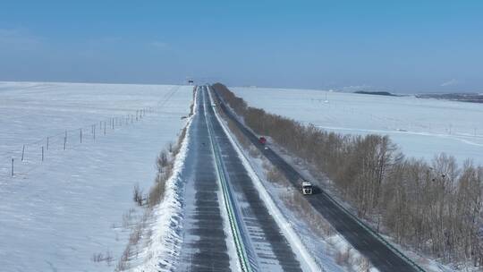 穿越草原的高速公路国道汽车白毛风风吹雪视频素材模板下载