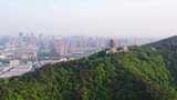 杭州临平公园东来阁与城市建筑风光航拍高清在线视频素材下载