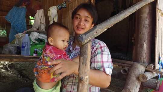泰国北部乃梭村村民