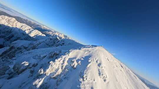 雪山雪景阳光高原山脉FPV航拍视频素材模板下载