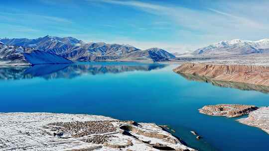 航拍雪后新疆克州阿克陶帕米尔高原白沙湖视频素材模板下载