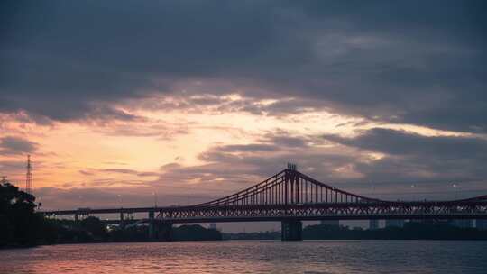 夕阳下的东莞东江大桥夜景延时