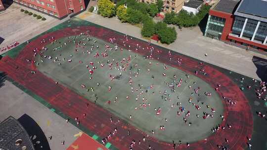 航拍小学操场 学生校园生活集体活动视频素材模板下载