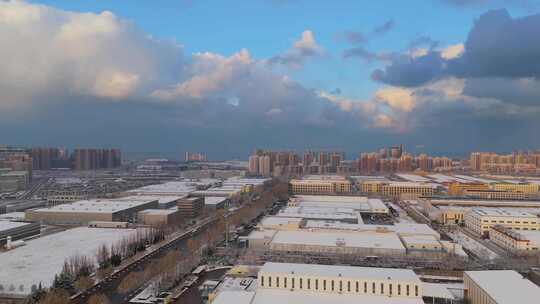 冬季航拍烟台大雪后的城市建筑和晚霞风景