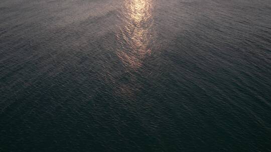 日落夕阳下大海中航行航拍素材
