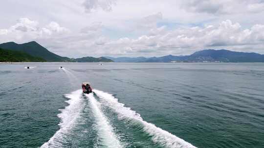 海边沿海旅游景区游船跟随航拍4k