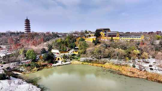 航拍瘦西湖景区园林雪景观音山大明寺宋夹城