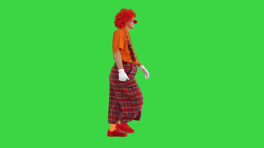 滑稽小丑在绿色屏幕上行走视频素材模板下载