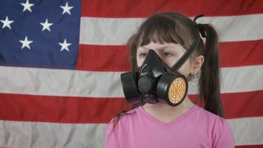 戴着呼吸器的美国孩子。
